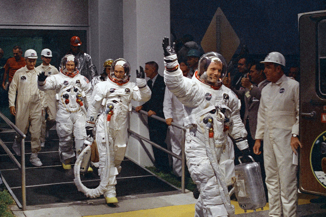 In this July 16, 1969 file photo, from right, Neil Armstrong, Michael Collins and Buzz Aldrin walk to the van that will take the crew to the launchpad at Kennedy Space Center on Merritt Island, Florida. [Photo: AP]<br>