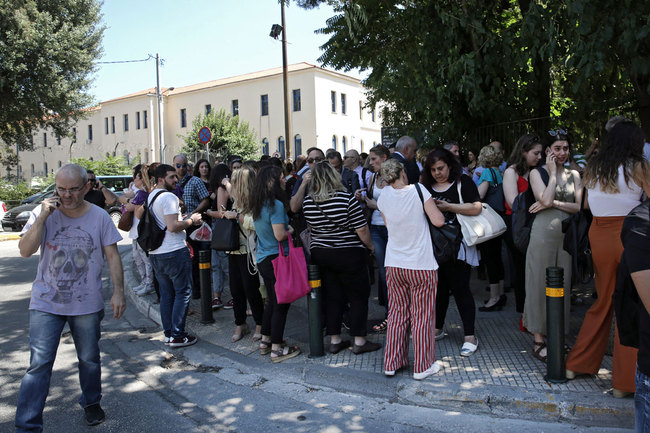 Citizens gather in an open area following an earthquake, in central Athens, Greece, 19 July 2019. [Photo: IC]