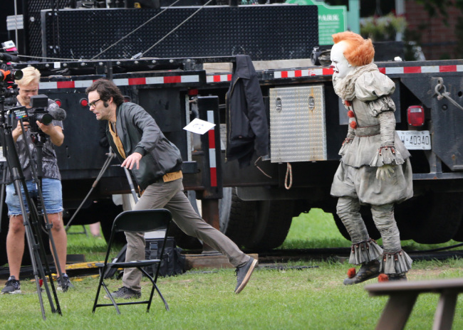 Bill Skarsgard and Bill Hader are pictured on the set of 'It: Chapter Two' in Port Hope, Canada on September 19, 2018. Skarsgard is dressed in costume as 'Pennywise' the clown. Hader plays the adult version on 'Richie Tozier' while Finn Wolfhard plays the younger version of Richie. [Photo: IC]