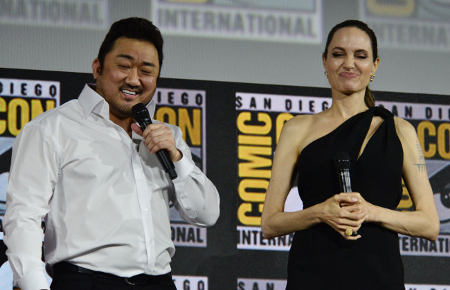 Angelina Jolie is introduced as a cast member for the latest Marvel Superhero film The Eternals during the Marvel Panel in Hall H during day 3 of 2019 Comic-Con in San Diego, Ca, July 20, 2019. Pictured: Dong -Seok Ma, Angelina Jolie. [Photo: IC]