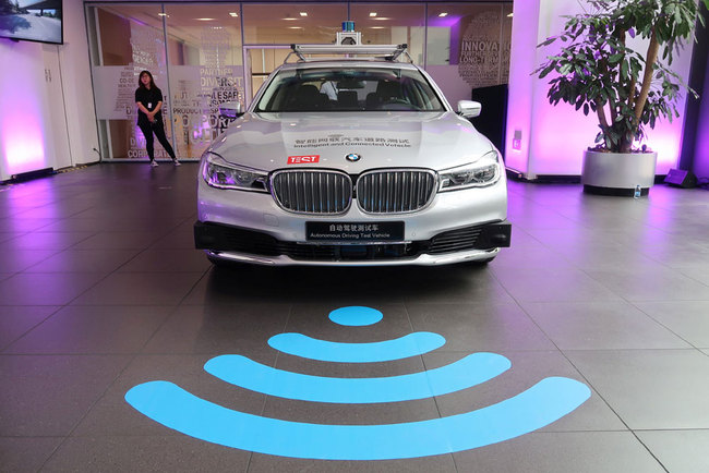 A BMW self-driving test vehicle is seen at a showroom following an event announcing the German automaker's partnership with China's Tencent Holdings in launching a computing center for self-driving vehicles, in Beijing on July 19, 2019. [Photo: VCG/Norihiko Shirouzu]