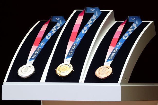 Medals for the Tokyo 2020 Olympic Games are unveiled during a ceremony marking one year before the start of the games in Tokyo on July 24, 2019. [Photo: VCG/AFP/Behrouz Mehri]