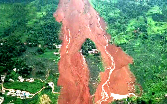 An aerial view of a landslide-hit village in the city of Liupanshui, southwestern Guizhou Province, July 24, 2019. The landslide happened at about 9:20 p.m. on Tuesday, and has killed at least 11 people so far.[Photo: IC]  