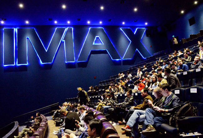 Chinese moviegoers wait to watch a film at a cinema featuring IMAX in Hangzhou, east China's Zhejiang Province, October 17, 2018. [Photo: IC]