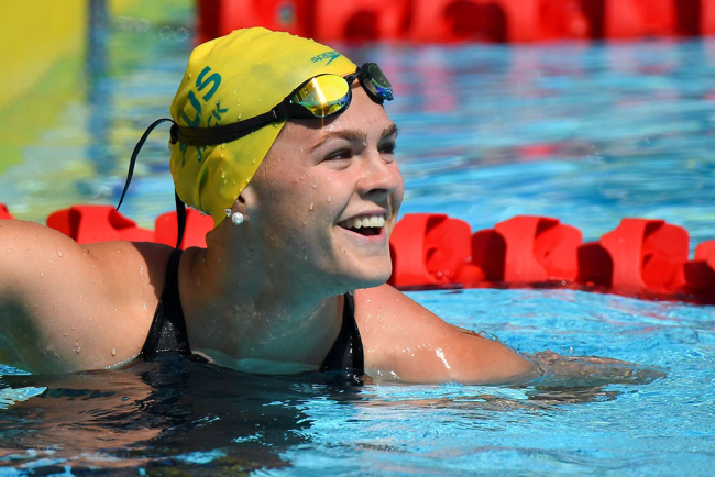 Australia's Shayna Jack smiles after the swimming women's 50m freestyle qualifications during the 2018 Gold Coast Commonwealth Games at the Optus Aquatic Centre in the Gold Coast on April 6, 2018. [Photo: AFP via VCG]