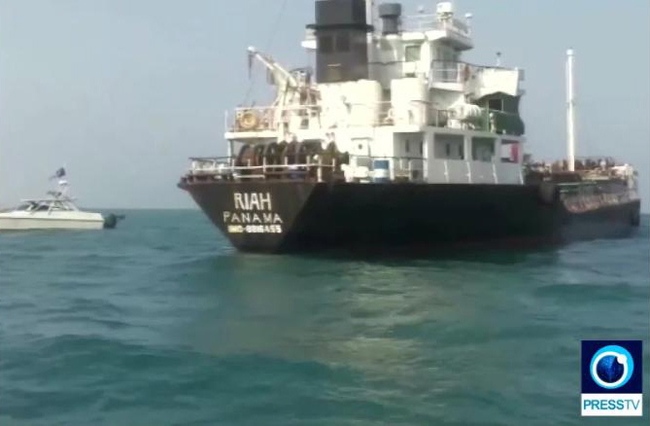 An undated picture made available by Iranian state television's English-language service, Press TV, on 18 July 2019, shows the Panamanian-flagged oil tanker MT Riah surrounded by Iranian Revolutionary Guard vessels in strait of Hormuz in Persian Gulf, Iran. [File Photo: IC]