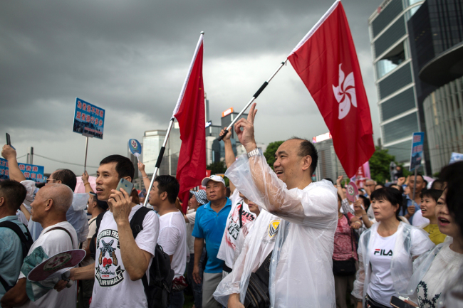 People rally to oppose violence at a park in Hong Kong on July 20, 2019. [Photo: IC]
