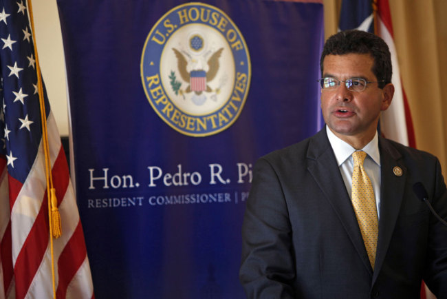 In this Sept. 24, 2013 file photo, Pedro Pierluisi, Puerto Rico's representative in the U.S. Congress, speaks during a conference in San Juan, Puerto Rico. A Puerto Rico legislator said Tuesday, July 30, 2019, that the U.S. territory's embattled governor plans to nominate Pierluisi as secretary of state. [File photo: AP/Ricardo Arduengo]