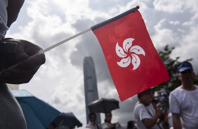 The regional flag of the Hong Kong Special Administrative Region. [File Photo: SOPA via IC/Miguel Candela]