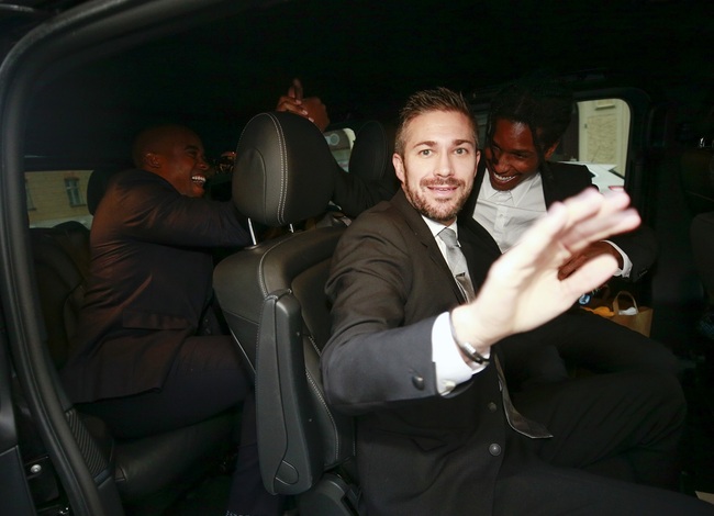 A$AP Rocky, right, leaves the district court after the third day of his trial in Stockholm, Friday, Aug. 2, 2019. [Photo: AP]