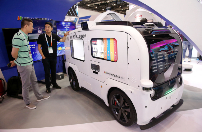 A 5G self-driving vehicle is showed at the China Beijing International Fair for Trade in Services in Beijing on May 29, 2019. [Photo: VCG]