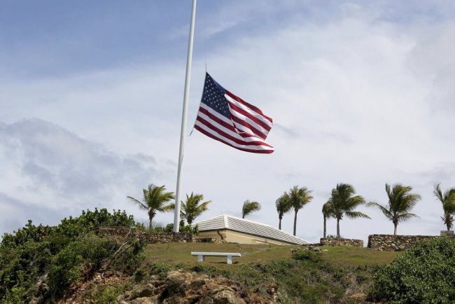 A U.S. flag flies at half staff on Little St. James Island, in the U. S. Virgin Islands, a property owned by Jeffrey Epstein, Wednesday, Aug. 14, 2019. [Photo: AP]
