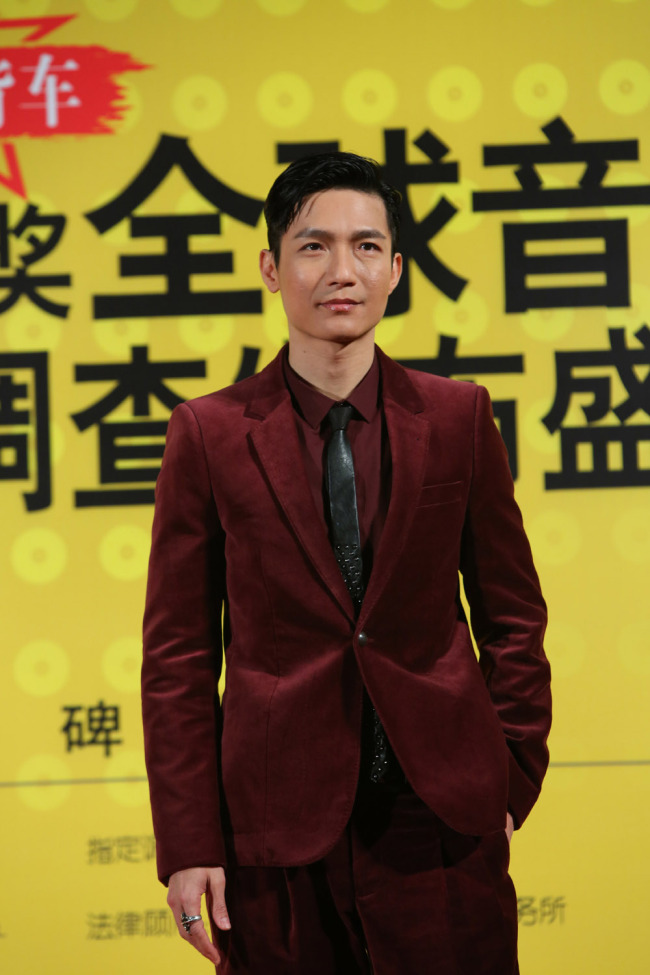 Chinese singer Chen Chusheng poses during the red carpet event of the 11th Huading Awards Global Music Satisfaction Survey Release Ceremony in Shanghai, China, December 18, 2013. [Photo: IC]