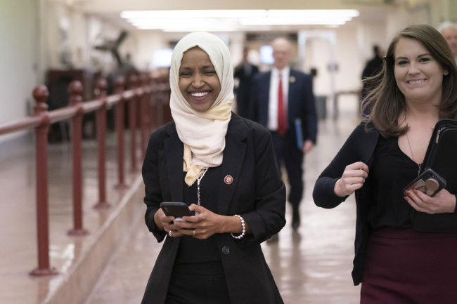 Ilhan Omar walks to the chamber on Thursday, March 7, 2019, on Capitol Hill in Washington. [File Photo: IC]
