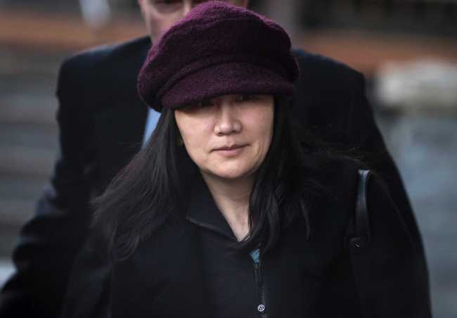 Huawei chief financial officer Meng Wanzhou leaves her home to attend a court appearance in Vancouver, British Columbia. [File photo: IC/Darryl Dyck/The Canadian Press]
