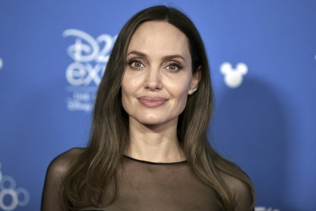 Angelina Jolie attends the "Go Behind the Scenes with the Walt Disney Studios," press line at the 2019 D23 Expo, Saturday, Aug. 24, 2019, in Anaheim, Calif. [Photo: AP]
