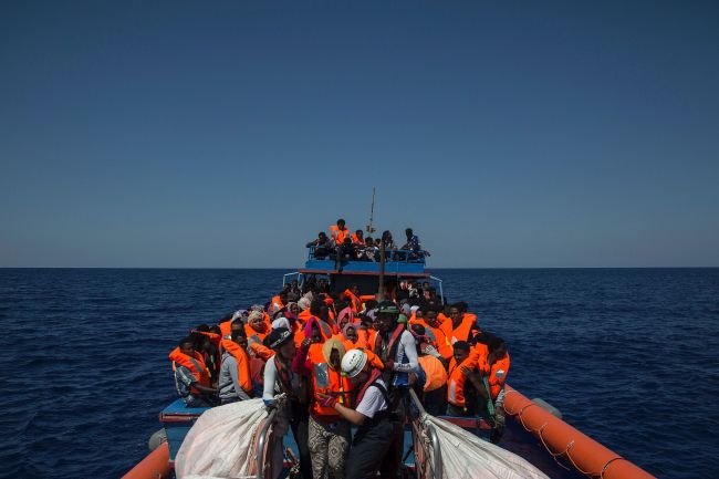 Migrants are rescued by members of the Aquarius rescue ship in the Mediterranean Sea, 30 nautical miles from the Libyan coast, on August 2, 2017. [File photo: VCG] 