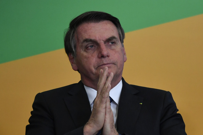 Brazil's President Jair Bolsonaro during a ceremony on August 22, 2019, at the Palacio do Planalto, which marks the launch of the SecomVC project. [Photo: Mateus Bonomi/AGIF via AP via IC]