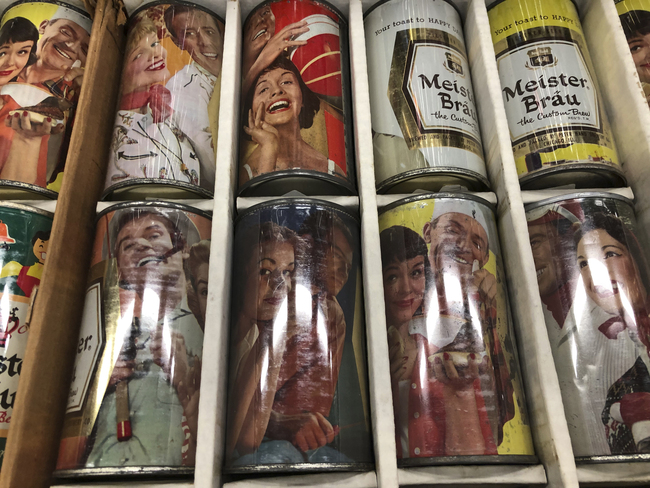 Vintage mid-century beer cans are on display Thursday, Aug. 29, 2019, in Albuquerque, N.M., at the 49th annual gathering of members of the Brewery Collectibles Club of America. Collectors from around the world began Thursday buying, trading and selling containers of brews at the annual four-day event billed the "CANvention." [Photo: AP/Russell Contreras]