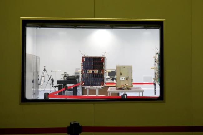 A handout photo on August 31, 2019 shows the Nahid-1 domestically-built satellite at the space research centre in Tehran. [Photo: Iran's Information and Communication Ministry office / AFP]