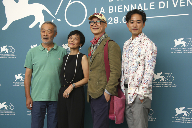 Actors Tian Zhuangzhuang, left, Sylvia Chang, director Yonfan and Alex Lam pose for photographers at the photo call for the film 'No. 7 Cherry Lane' at the 76th edition of the Venice Film Festival in Venice, Italy, Monday, September 02, 2019. [Photo: IC]