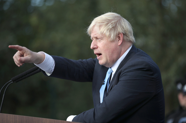 Britain's Prime Minister Boris Johnson takes a question as he speaks during a visit with the police in West Yorkshire, northern England, on September 5, 2019. [Photo: AFP/Pool /Danny Lawson]