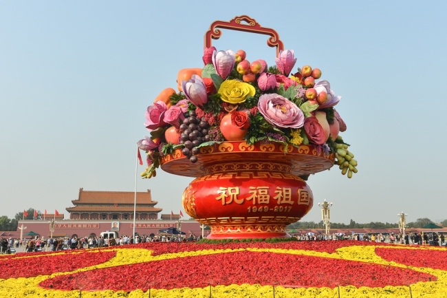 A general view of a huge flower and fruit basket monument at Tiananmen Square in Beijing, September 27, 2017. [File Photo: IC]