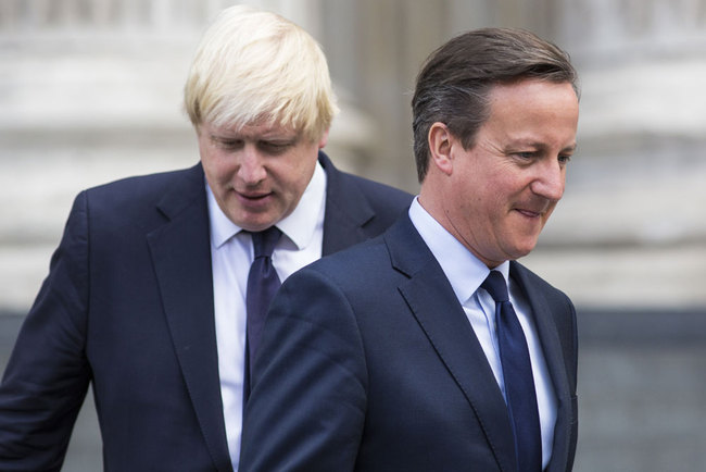 In this file photo taken on July 7, 2015, British Prime Minister David Cameron (R) and London Mayor Boris Johnson leave St Paul's Cathedral in central London after attending a memorial service in memory of the 52 victims of the 7/7 London attacks. [File photo: AFP/Jack Taylor]