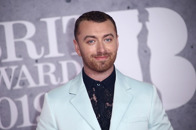 File photo: Singer Sam Smith posing for photographers upon arrival at the Brit Awards in London on Feb. 20, 2019. [Photo: AP/Joel C Ryan/Invision]