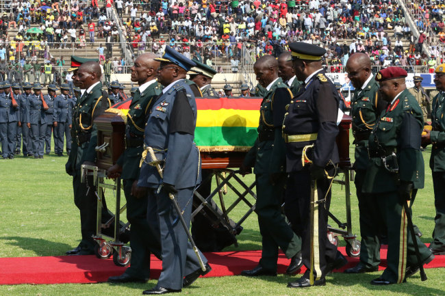 Robert Mugabe's casket is being escorted by military personnel at a state funeral held for him in Harare, Zimbabwe on Saturday, September 14, 2019. [Photo: China Plus/Gao Junya]
