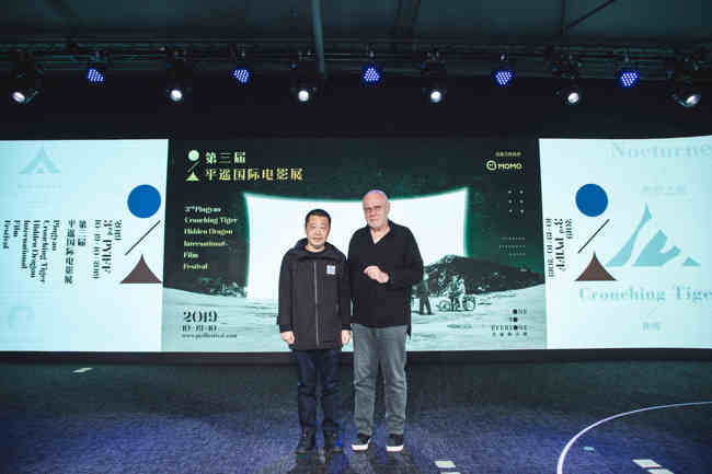 Chinese veteran director Jia Zhangke (left) and Pingyao International Film Festival's artistic director Marco Mueller (right) attend a<br>promotional event held Monday afternoon on September 16, 2019 in Beijing. [Photo provided to China Plus]