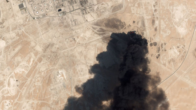 This satellite overview handout image obtained September 16, 2019 courtesy of Planet Labs Inc. shows damage to oil/gas infrastructure from weekend drone attacks at Abqaig on September 14, 2019 in Saudi Arabia. [Photo: Planet Labs Inc./ AFP]