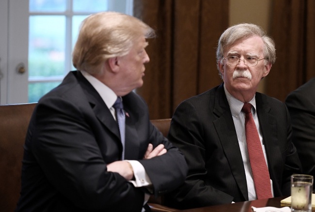 U.S President Donald Trump (L) and John Bolton (R) , the national security adviser attend a briefing from Senior Military Leadership in the Cabinet Room of the White House, on April 9, 2018 in Washington, DC. [File Photo:  IC/Olivier Douliery/Abaca]