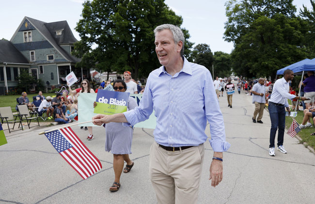 In this July 4, 2019, file photo, Democratic presidential candidate New York Mayor Bill de Blasio walks in the Independence Fourth of July parade in Independence, Iowa. de Blasio said Friday, Sept. 20 that he is ending his campaign for the Democratic presidential nomination. [Photo: AP]