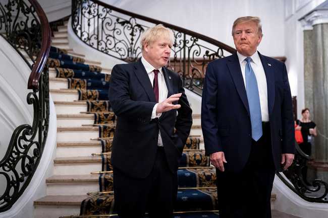 President Donald Trump and Britain's Prime Minister Boris Johnson, left, speak to the media before a working breakfast meeting at the Hotel du Palais on the sidelines of the G-7 summit in Biarritz, France, Sunday, Aug. 25, 2019. [Photo: Erin Schaff/The New York Times via AP]