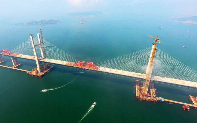 The Pingtan Strait Road-rail Bridge, the world's longest cross-sea road-rail bridge, is connected in southeast China's Fujian Province on June 5, 2019. [File Photo: IC]