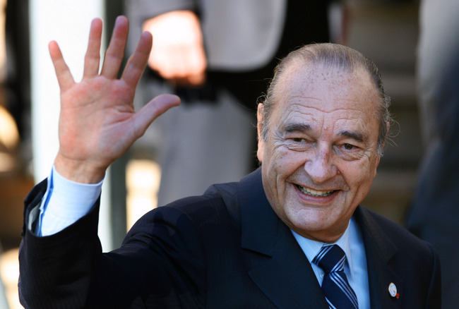 In this file photo taken on February 15, 2007 French President Jacques Chirac waves to the crowd, after the opening of the 24th Africa-France summit in Cannes, southern France. [File Photo: AFP/Pool/Patrick Kovarik]