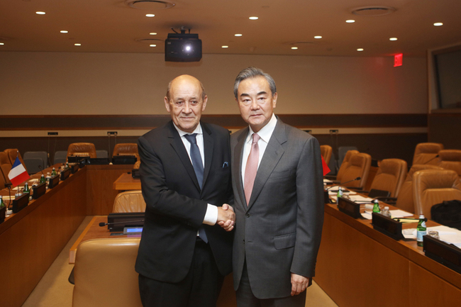 Chinese Foreign Minister Wang Yi meets with French Foreign Minister Jean-Yves Le Drian on the sidelines of the General Debate of the 74th session of the UN General Assembly on Wednesday, September 25, 2019. [Photo: fmprc.gov.cn]