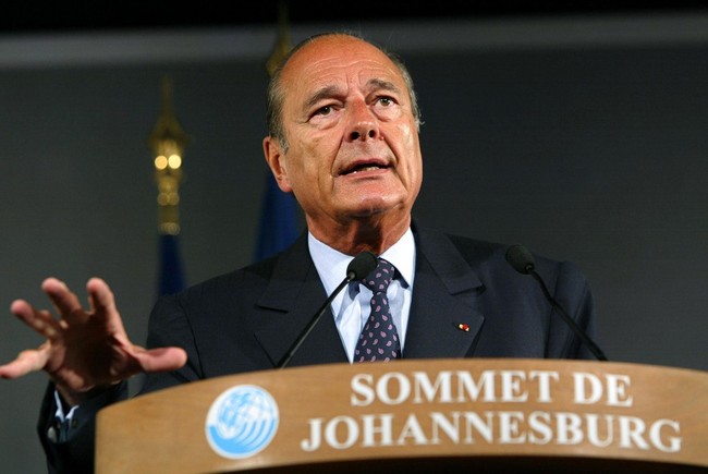 Then French President Jacques Chirac gestures as he delivers a speech in Johannesburg, as leaders from around the world were gathering at the UN World Summit on Sustainable Development for a three-day debate on the future of the planet on September 2, 2002. [File Photo: AFP/Patrick Kovarik]