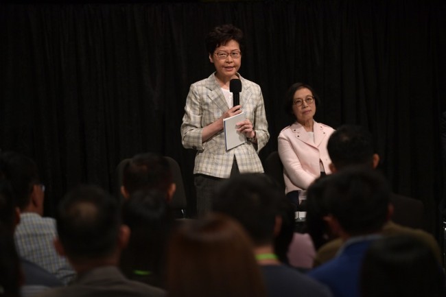 Hong Kong Chief Executive Carrie Lam takes part in a town hall meeting at Queen Elizabeth Stadium in the Wanchai district of Hong Kong on September 26, 2019. [Photo: AFP/Nicolas ASFOURI]