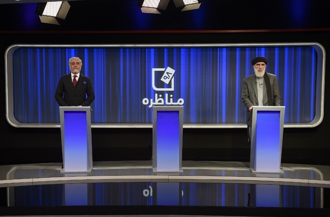 Afghan presidential candidates Abdullah Abdullah (L) and Gulbuddin Hekmatyar take part in a presidential debate at Tolo News TV station in Kabul on September 25, 2019. [Photo: AFP]