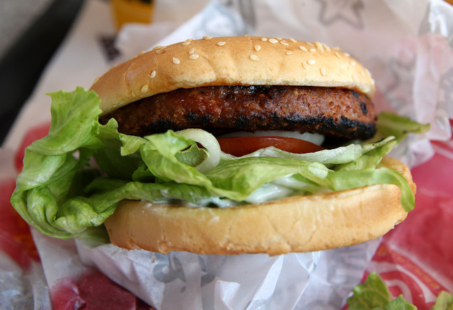 In this photo illustration, a Carl's Jr. Famous Star Beyond Meat burger is displayed at a Carl's Jr. restaurant on June 10, 2019 in San Francisco, California. Plant-based burger company Beyond Meat has seen their stock price surge over 475 percent since its $25 IPO on May 1. [Photo: VCG]