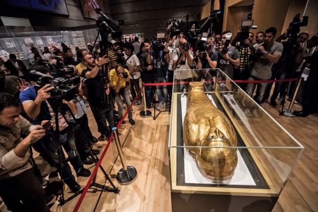 A picture taken on October 1, 2019, shows the Golden Coffin of Nedjemankh, on display at the National Museum of Egyptian Civilization in Cairo, following its repatriation from the US. [Photo: AFP/Khaled Desoukl]