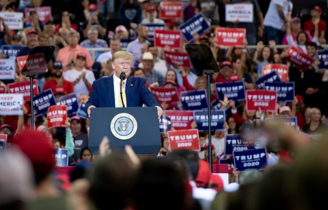 US President Donald Trump looks on during a "Keep America Great" rally at Sudduth Coliseum at the Lake Charles Civic Center in Lake Charles, Louisiana, on October 11, 2019. [Photo: AFP]