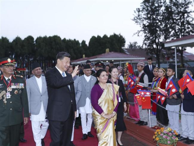 Chinese President Xi Jinping attends a welcome ceremony held by Nepali President Bidya Devi Bhandari upon his arrival at the airport in Kathmandu, Nepal, Oct. 12, 2019. [Photo: Xinhua/Ju Peng]
