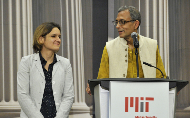 Nobel Prize winners in economics, Abhijit Banerjee (R) and Esther Duflo, look on during a press conference at MIT in Cambridge, Massachusetts on October 14, 2019.[Photo: AFP/Joseph Prezioso]