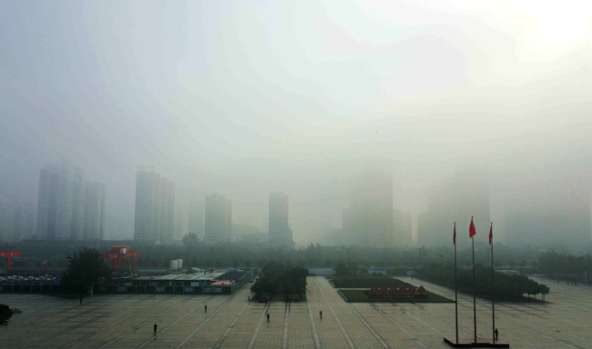 The city of Luoyang, Henan Province, is shrouded in fog on October 19, 2019. [Photo: IC]