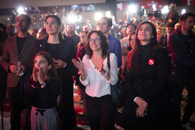 Supporters of Liberal party candidate, Justin Trudeau, react to the announcements of the first results at the Palais des Congres in Montreal during Team Justin Trudeau 2019 election night event in Montreal, Canada on October 21, 2019. [Photo: AFP/Sebastien ST-JEAN]