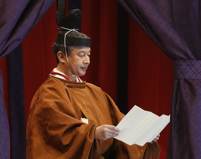 Emperor Naruhito officially proclaims his ascension to the Chrysanthemum throne during an enthronement ceremony at the Imperial Palace in Tokyo on October 22, 2019. [Photo: AFP/Japan Pool via Jiji Press/STR]