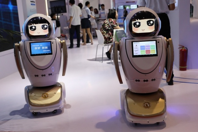 Intelligent robots are displayed during the 2019 Word Robot Conference (WRC) in Beijing, China, August 20 2019. [File Photo: IC]